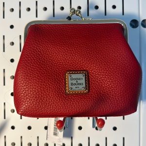Dooney and Bourke small bag/ purse. New with tags, red, perfect condition.